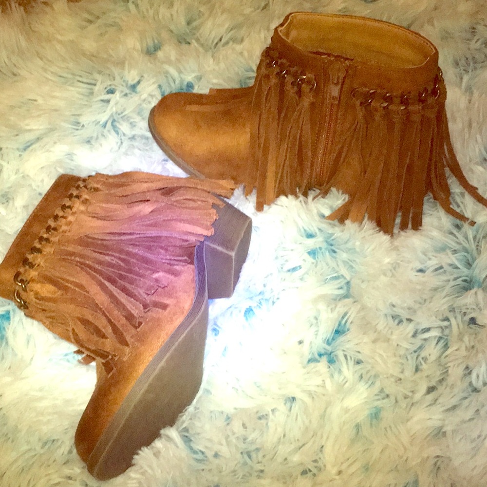 The brand is called not rated.Size 13 ,never worn.